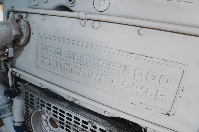 Slide: The Image of Engine detail of a 1999 Viking 58 Convertible, featuring DDC Series 2000 MTU Marine Power. - 104