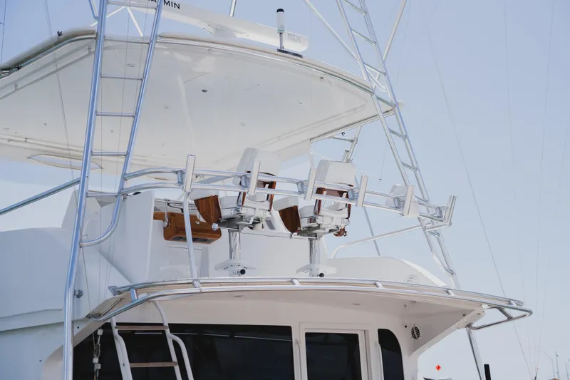 Slide: The Image of 1999 Viking 58 Convertible yacht with tower and fishing chairs, viewed from the stern. - 15