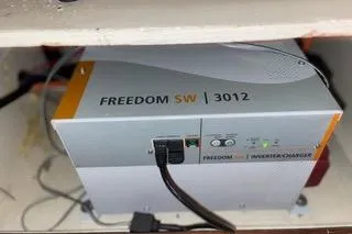 Slide: The Image of 1989 Hans Christian INDEPENDENCE 45 TRAWLER deck view with railing and seating area. - 10