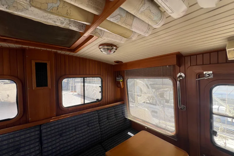 Slide: The Image of Interior of 1989 Hans Christian INDEPENDENCE 45 TRAWLER with wooden stairs and kitchen area. - 100