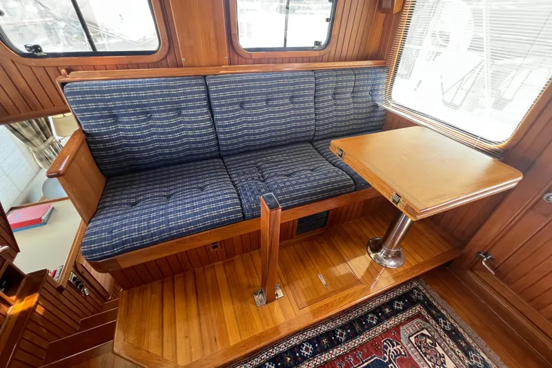 Slide: The Image of 1989 Hans Christian INDEPENDENCE 45 TRAWLER interior with wooden paneling and cozy cabin. - 102