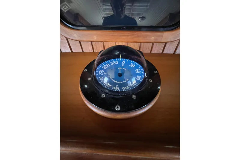 Slide: The Image of 1989 Hans Christian INDEPENDENCE 45 TRAWLER cabin with bed, desk, and porthole windows. - 103