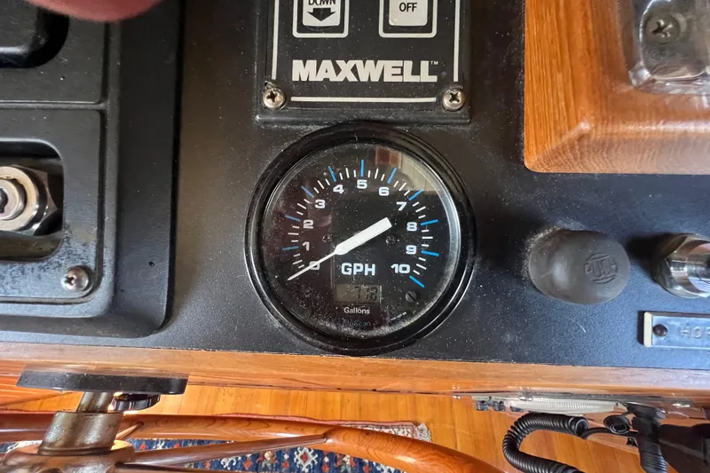 Slide: The Image of Wooden closet interior with a patterned rug, inside a 1989 Hans Christian INDEPENDENCE 45 TRAWLER. - 107