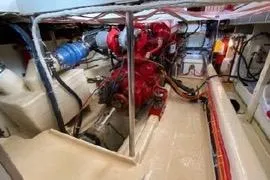 Slide: The Image of 1989 Hans Christian INDEPENDENCE 45 TRAWLER deck view with docked boat in background. - 11