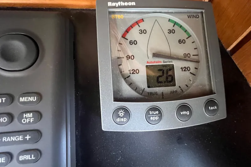 Slide: The Image of Wooden cabinet interior on 1989 Hans Christian INDEPENDENCE 45 TRAWLER, featuring sliding door and outlet. - 111