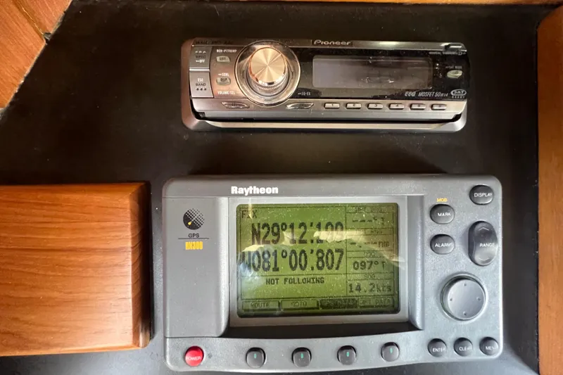 Slide: The Image of Ceiling light fixture on 1989 Hans Christian INDEPENDENCE 45 TRAWLER, featuring wooden paneling. - 119