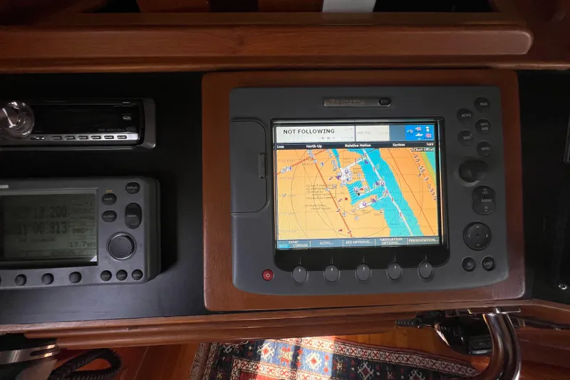 Slide: The Image of 1989 Hans Christian INDEPENDENCE 45 TRAWLER interior with wooden cabinetry and mirror. - 120