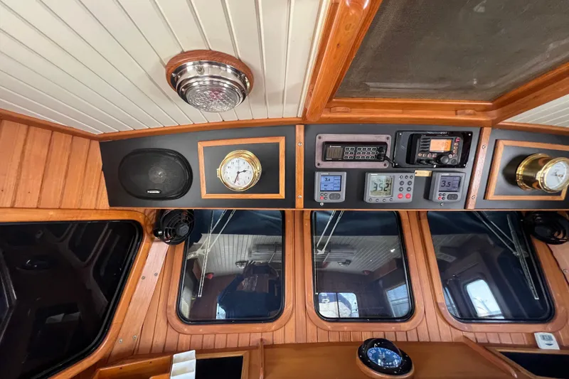 Slide: The Image of First Alert detector on wooden surface of 1989 Hans Christian INDEPENDENCE 45 TRAWLER. - 124