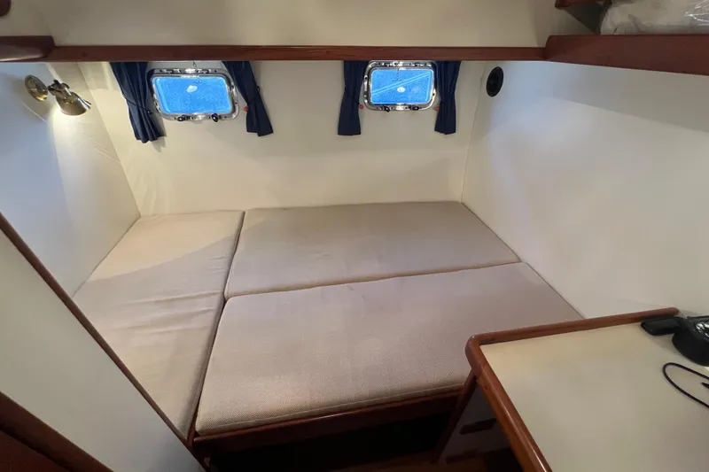 Slide: The Image of Electrical control panel of 1989 Hans Christian INDEPENDENCE 45 TRAWLER with various switches and gauges. - 134