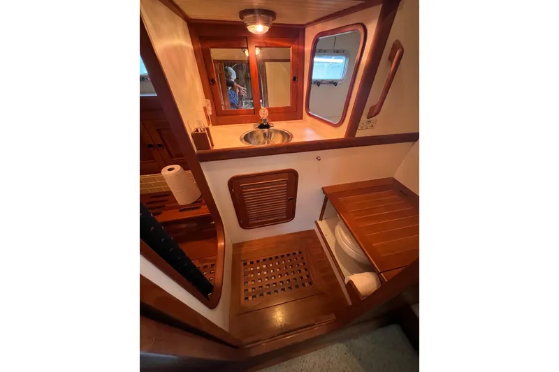 Slide: The Image of Engine room of 1989 Hans Christian INDEPENDENCE 45 TRAWLER with visible machinery and components. - 139