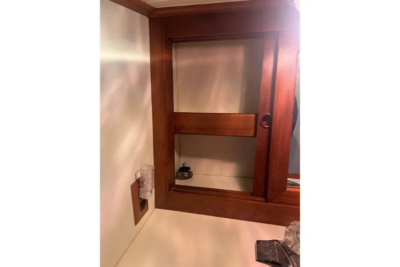 Slide: The Image of Engine room of 1989 Hans Christian INDEPENDENCE 45 TRAWLER with visible pipes and equipment. - 140