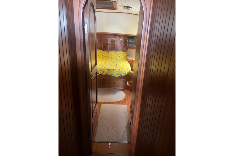 Slide: The Image of Engine room of 1989 Hans Christian INDEPENDENCE 45 TRAWLER with fire extinguishers and piping. - 141