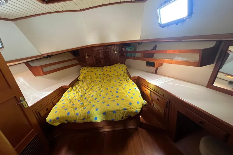 Slide: The Image of Engine room of 1989 Hans Christian INDEPENDENCE 45 TRAWLER with visible pipes and equipment. - 143