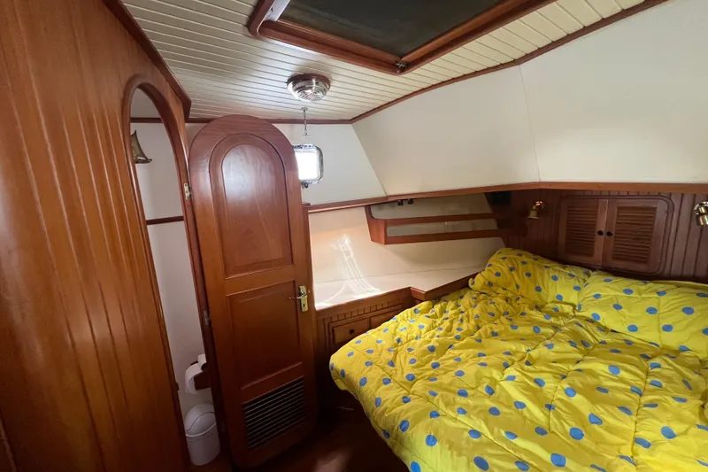 Slide: The Image of Engine room of 1989 Hans Christian INDEPENDENCE 45 TRAWLER with electrical panels and wiring. - 144