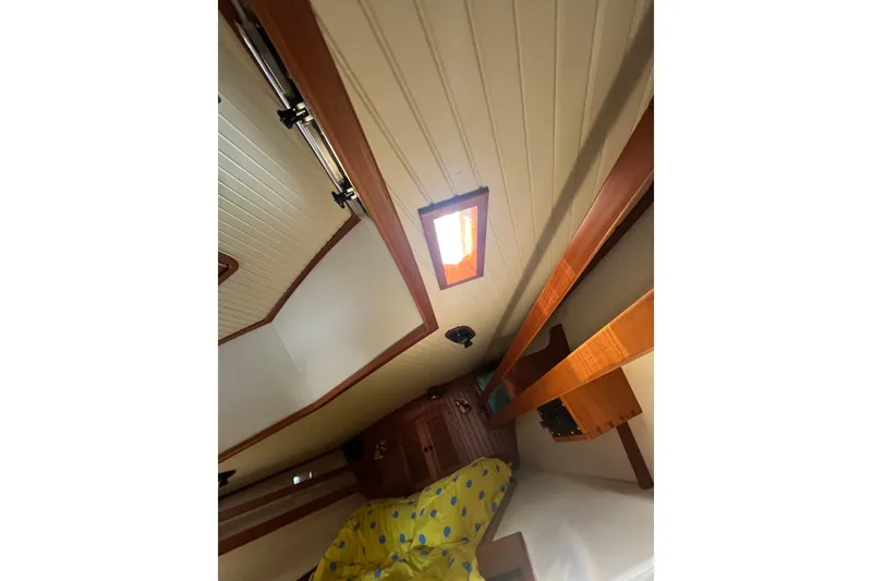 Slide: The Image of Engine room of 1989 Hans Christian INDEPENDENCE 45 TRAWLER with fire extinguisher and piping. - 146