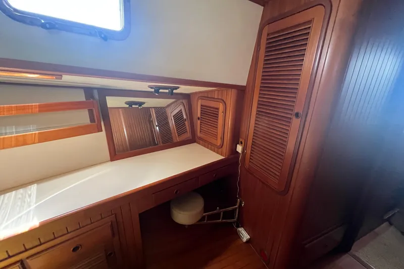 Slide: The Image of Engine room of 1989 Hans Christian INDEPENDENCE 45 TRAWLER, showcasing mechanical components and wiring. - 148