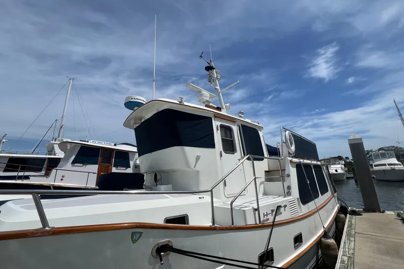 Slide: The Image of Deck view of 1989 Hans Christian INDEPENDENCE 45 TRAWLER with yellow hose and fittings. - 15