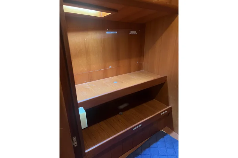 Slide: The Image of Engine room of 1989 Hans Christian INDEPENDENCE 45 TRAWLER with red mechanical components. - 151