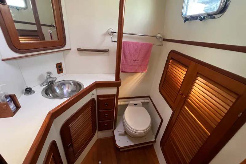 Slide: The Image of Engine room of 1989 Hans Christian INDEPENDENCE 45 TRAWLER, showcasing mechanical components and wiring. - 152