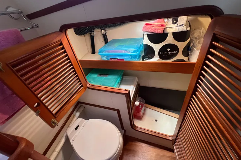 Slide: The Image of Engine room of 1989 Hans Christian INDEPENDENCE 45 TRAWLER, featuring red mechanical components. - 153