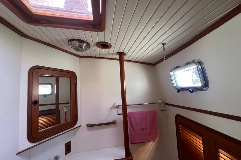 Slide: The Image of Engine room of 1989 Hans Christian INDEPENDENCE 45 TRAWLER with visible machinery and equipment. - 157