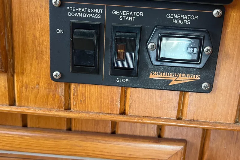 Slide: The Image of Engine room of 1989 Hans Christian INDEPENDENCE 45 TRAWLER with red machinery components. - 158