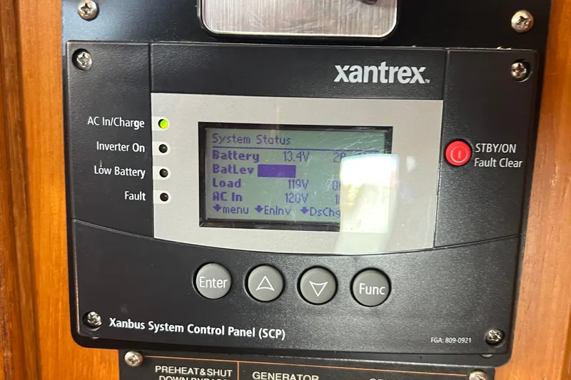 Slide: The Image of Engine room of 1989 Hans Christian INDEPENDENCE 45 TRAWLER with red machinery and wiring. - 159