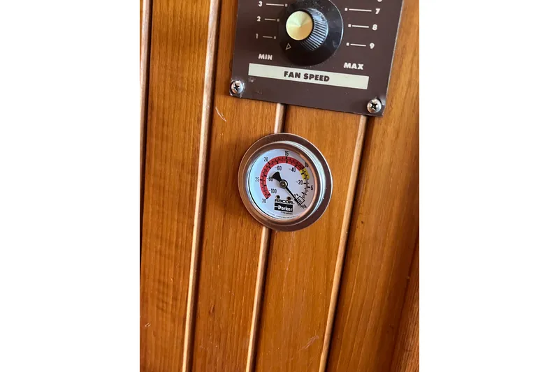 Slide: The Image of Engine room of 1989 Hans Christian INDEPENDENCE 45 TRAWLER with red machinery and wiring. - 161