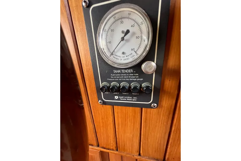 Slide: The Image of Engine room of 1989 Hans Christian INDEPENDENCE 45 TRAWLER, showcasing mechanical components and piping. - 164