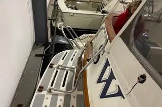 Slide: The Image of 1989 Hans Christian INDEPENDENCE 45 TRAWLER docked at marina under blue sky. - 2