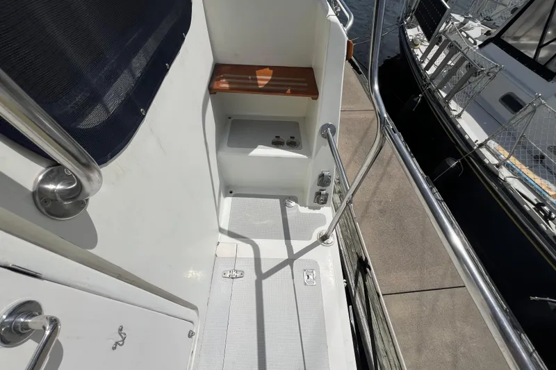 Slide: The Image of 1989 Hans Christian INDEPENDENCE 45 TRAWLER with radar equipment, docked at a marina. - 20