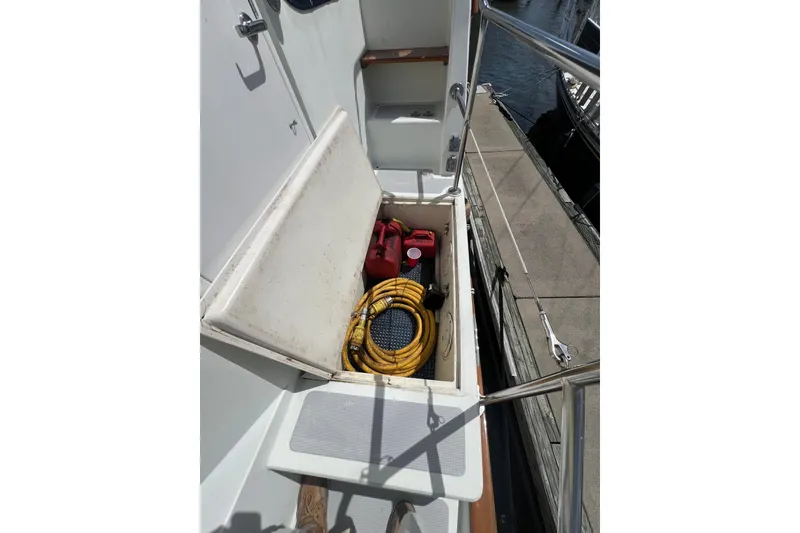 Slide: The Image of 1989 Hans Christian INDEPENDENCE 45 TRAWLER docked, featuring radar and navigation equipment. - 22