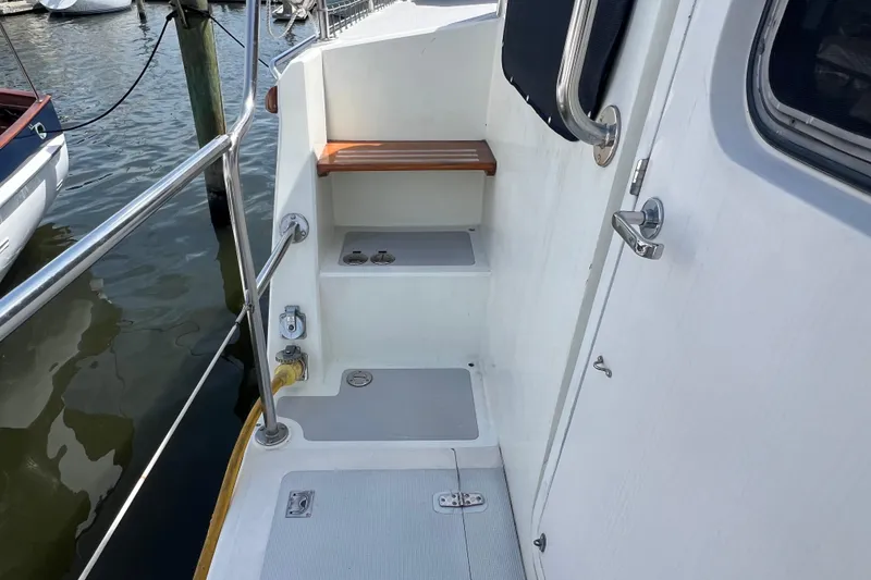 Slide: The Image of Deck view of 1989 Hans Christian INDEPENDENCE 45 TRAWLER in marina setting. - 28