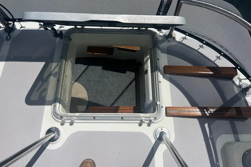 Slide: The Image of 1989 Hans Christian INDEPENDENCE 45 TRAWLER docked, featuring swim platform and water view. - 36