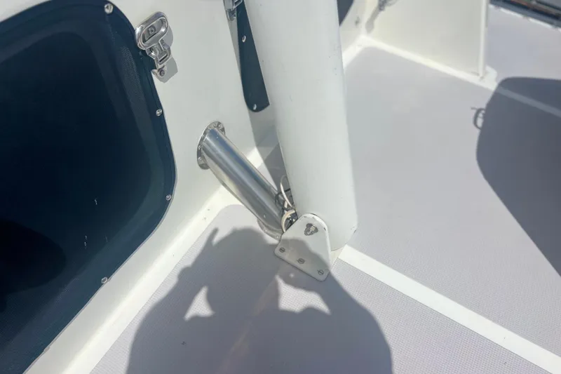 Slide: The Image of 1989 Hans Christian INDEPENDENCE 45 TRAWLER deck view with canopy and marina backdrop. - 43