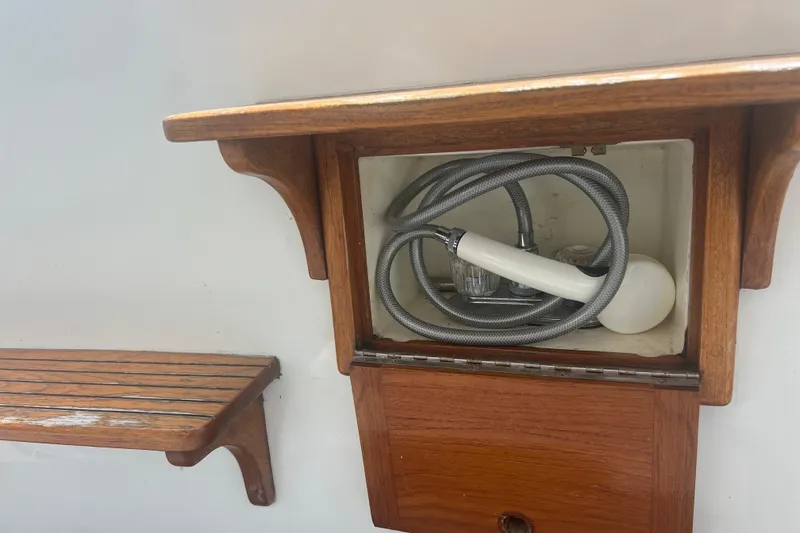 Slide: The Image of Polished wooden interior of 1989 Hans Christian INDEPENDENCE 45 TRAWLER with metal support pole. - 52