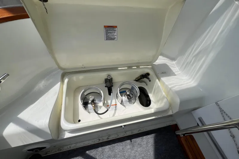 Slide: The Image of Interior of 1989 Hans Christian INDEPENDENCE 45 TRAWLER with cozy seating and wooden cabinetry. - 54