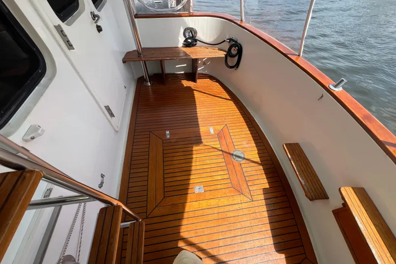 Slide: The Image of Interior of 1989 Hans Christian INDEPENDENCE 45 TRAWLER with seating and wood paneling. - 56