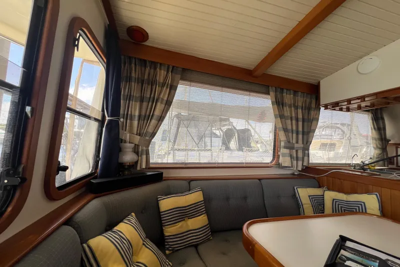 Slide: The Image of Interior of 1989 Hans Christian INDEPENDENCE 45 TRAWLER with Norcold refrigerator and cozy seating area. - 66