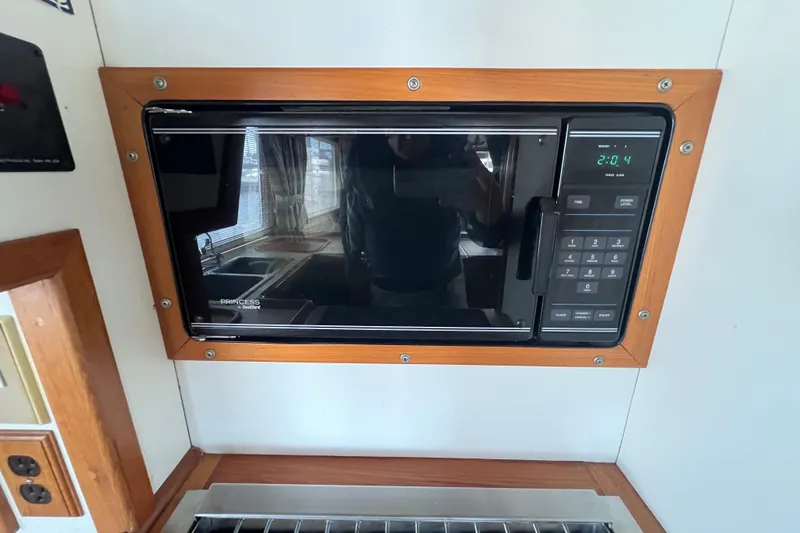 Slide: The Image of Dashboard gauges of a 1989 Hans Christian INDEPENDENCE 45 TRAWLER, displaying engine hours and pressure. - 85