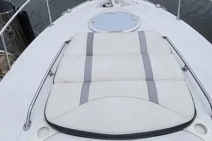 Slide: The Image of 2017 Monterey 275 Sport Yacht bow with cushioned sunpad and sleek design. - 14