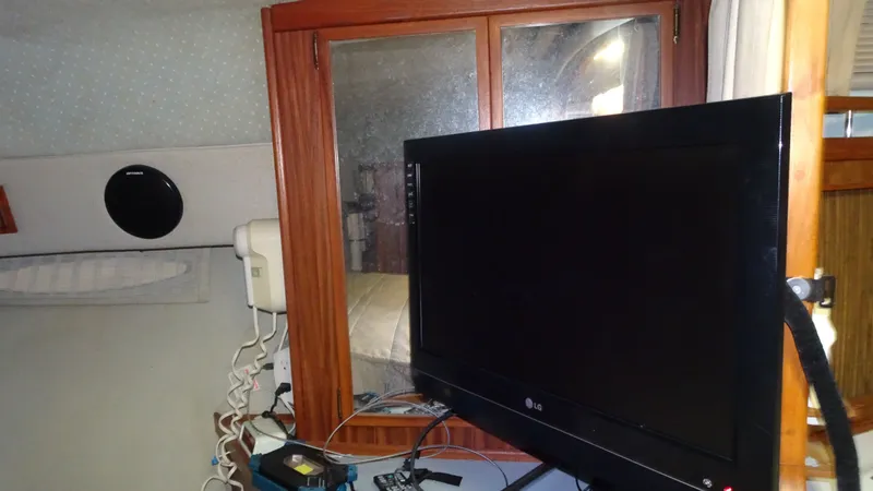 Slide: The Image of Interior of 1987 Sea Ray 340 Sundancer with TV. - 18