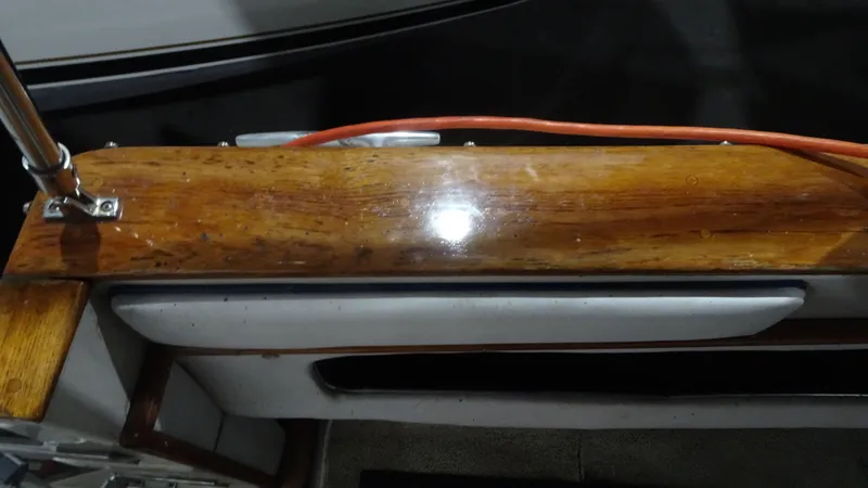 Slide: The Image of Wood trim on a 1987 Sea Ray 340 Sundancer boat. - 26