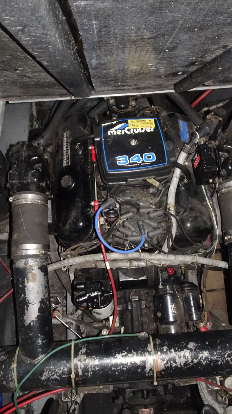 Slide: The Image of Engine compartment of a 1987 Sea Ray 340 Sundancer boat. - 29