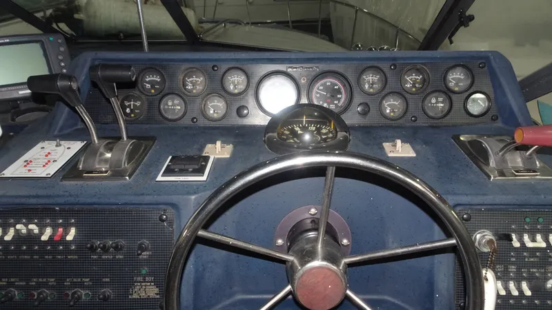 Slide: The Image of Dashboard of a 1987 Sea Ray 340 Sundancer boat. - 8