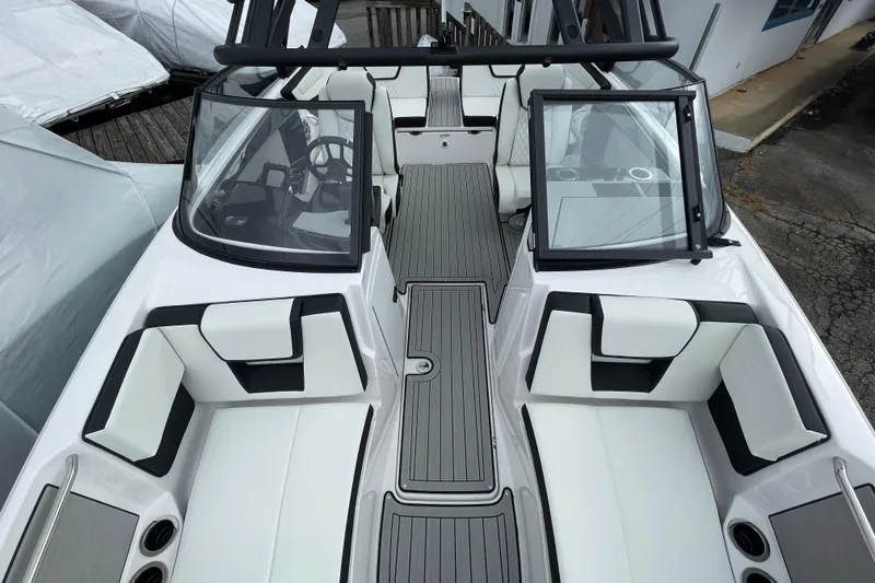 Slide: The Image of 2026 Yamaha Boats 222S interior, featuring sleek seating and modern design elements. - 18
