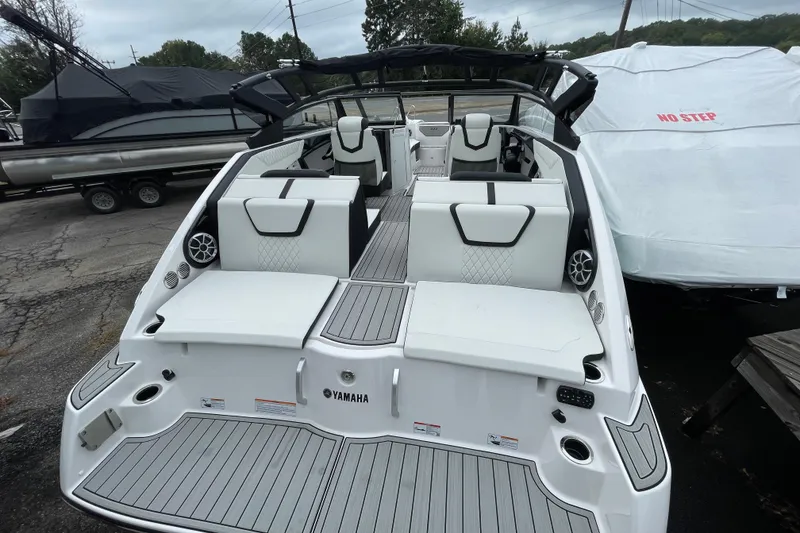 Slide: The Image of 2026 Yamaha Boats 222S with sleek white interior and modern design. - 9