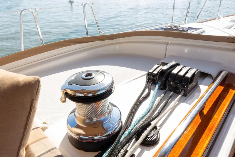Slide: The Image of Genoa furling controls on a 2015 Jeanneau 53 yacht deck. - 18