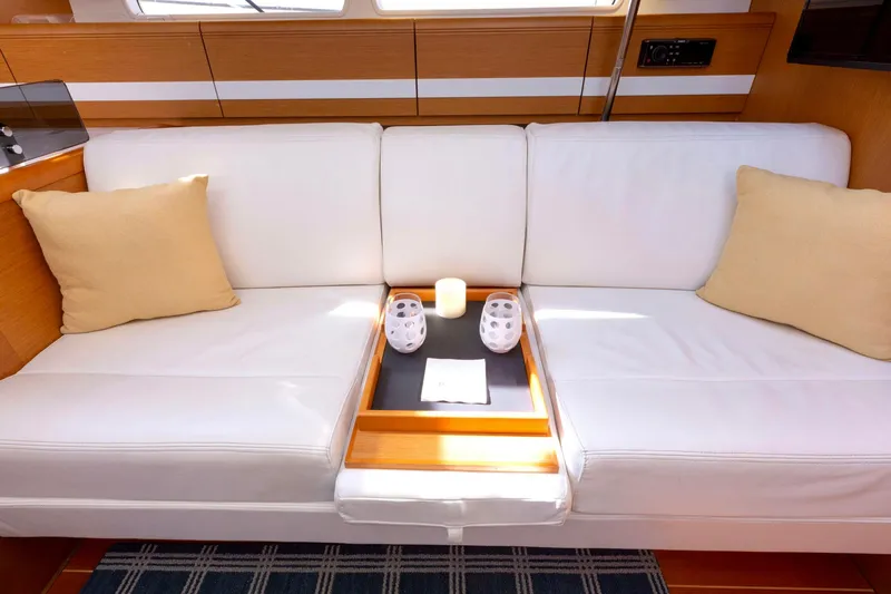 Slide: The Image of Luxurious interior of 2015 Jeanneau 53 yacht with modern seating and elegant decor. - 32