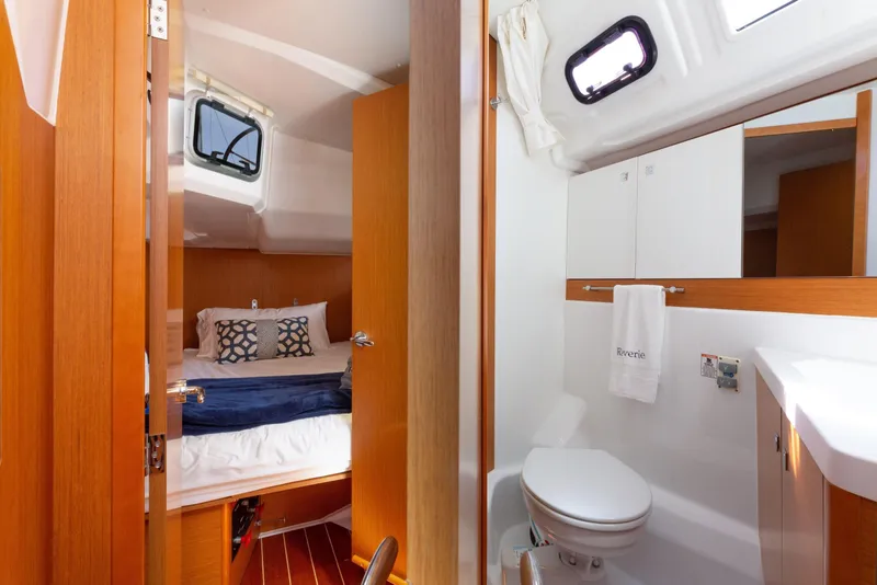 Slide: The Image of Cozy cabin interior of 2015 Jeanneau 53 yacht with bed and bathroom. - 43